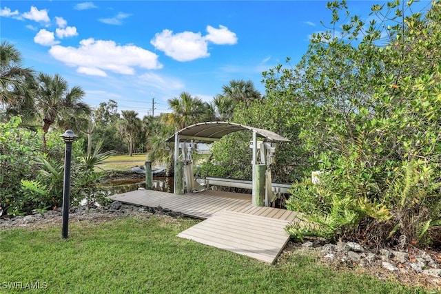 view of yard featuring a boat dock