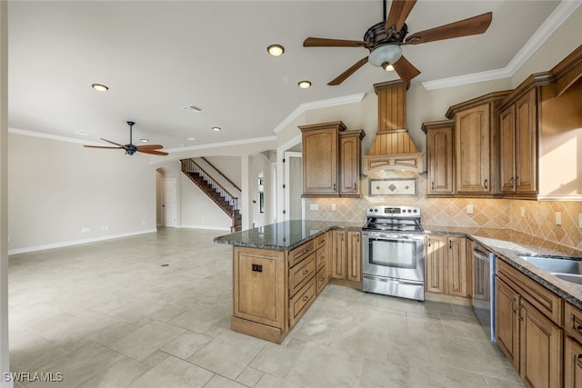 kitchen featuring ornamental molding, stainless steel appliances, sink, and dark stone counters