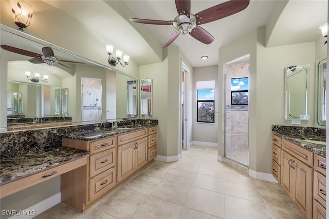 bathroom featuring vanity, tile patterned floors, ceiling fan, and walk in shower