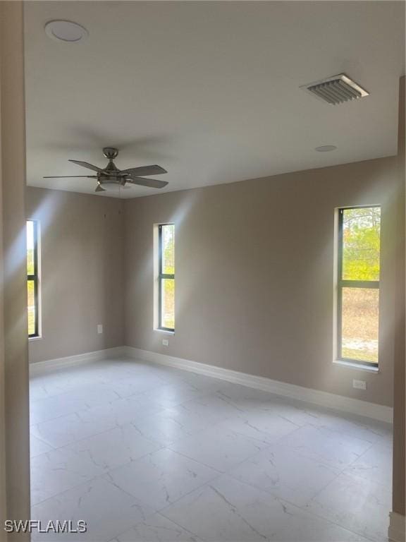 empty room featuring ceiling fan