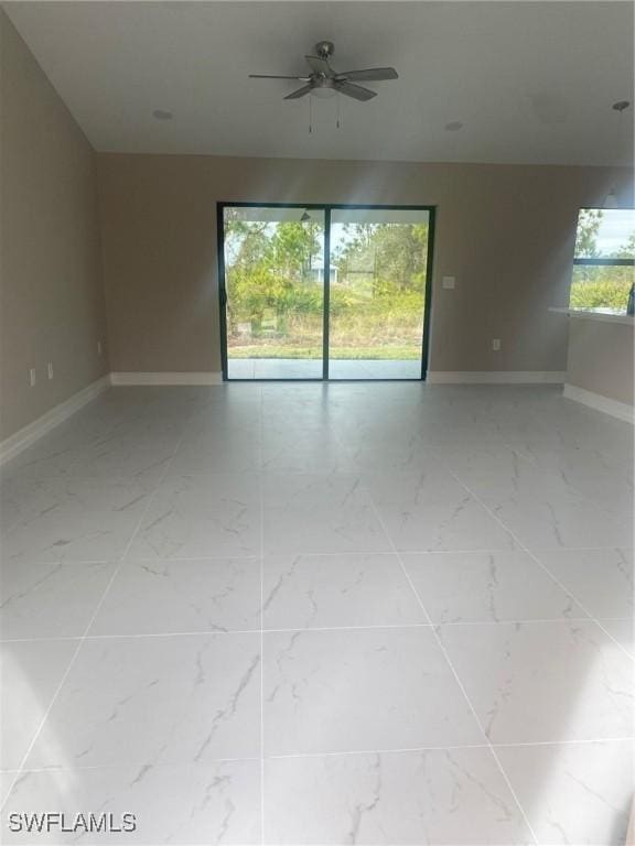 unfurnished room featuring ceiling fan