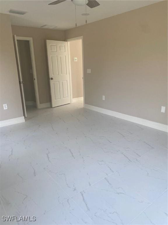 unfurnished room featuring ceiling fan