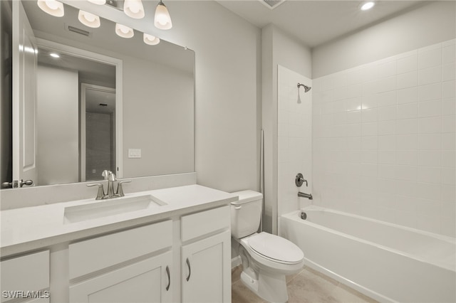 bathroom featuring visible vents, washtub / shower combination, toilet, tile patterned floors, and vanity