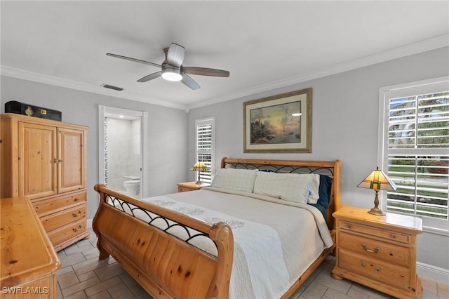 bedroom with crown molding, connected bathroom, and ceiling fan