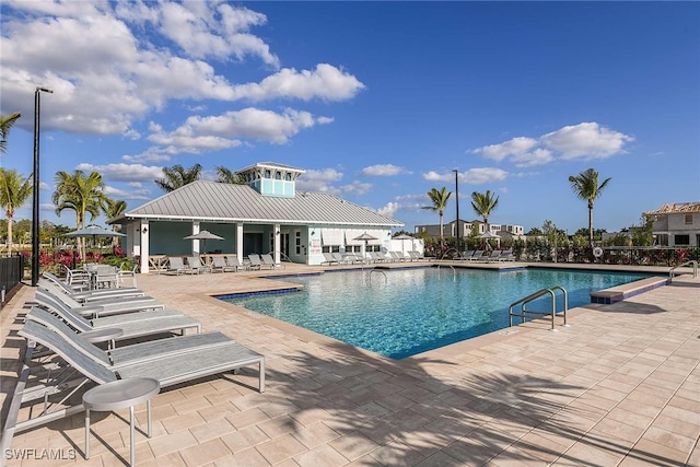 view of swimming pool featuring a patio