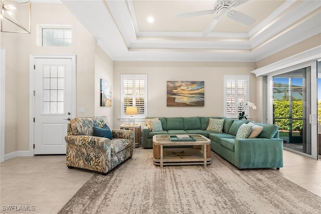 living room with ceiling fan and light tile patterned floors