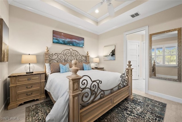 bedroom featuring ceiling fan and ornamental molding