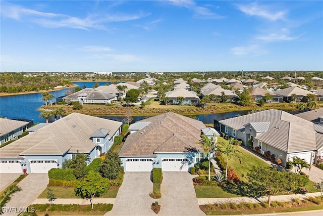 bird's eye view with a water view