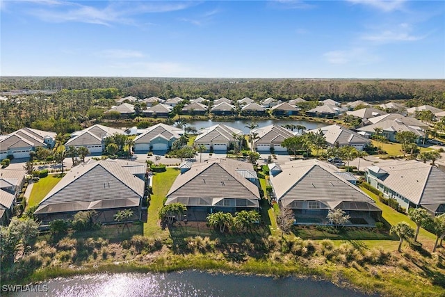 drone / aerial view with a water view