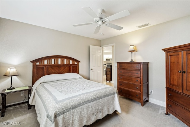 carpeted bedroom with ceiling fan