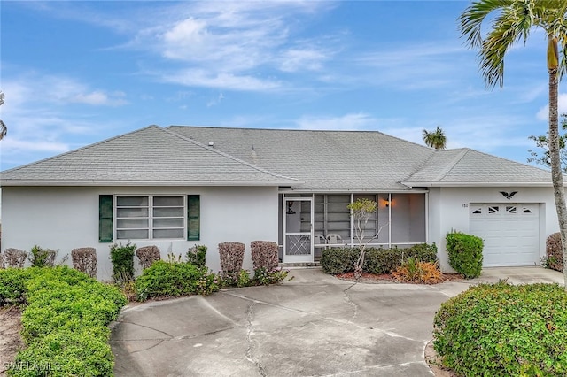 single story home with a garage