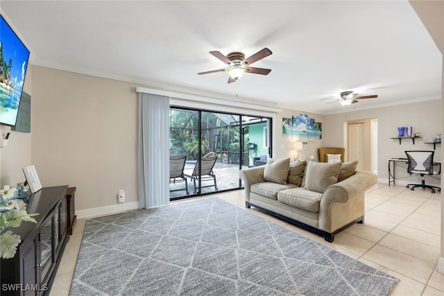 living room with ornamental molding, ceiling fan, and light tile patterned flooring