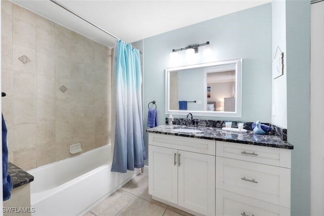 bathroom with vanity, shower / tub combo with curtain, and tile patterned floors