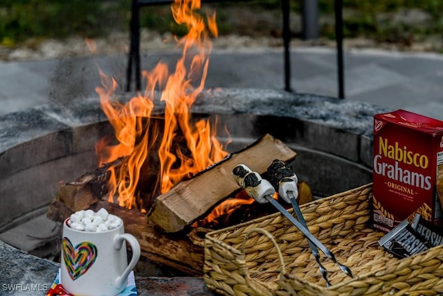 exterior details with a fire pit