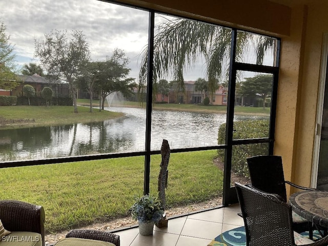 sunroom with a water view