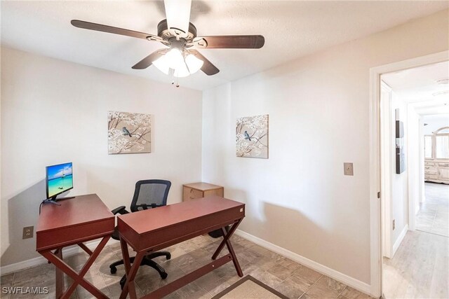 home office featuring ceiling fan