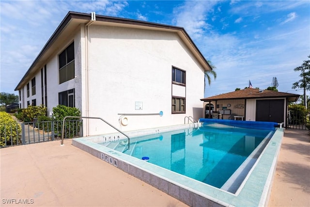 view of pool with a patio