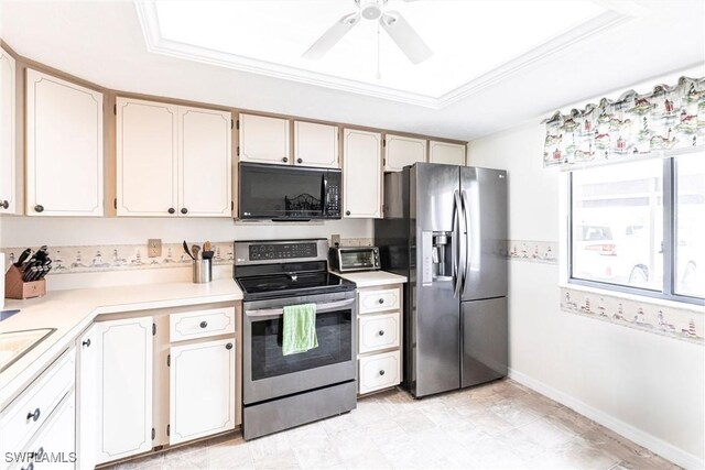 kitchen featuring white cabinetry, crown molding, stainless steel appliances, and ceiling fan