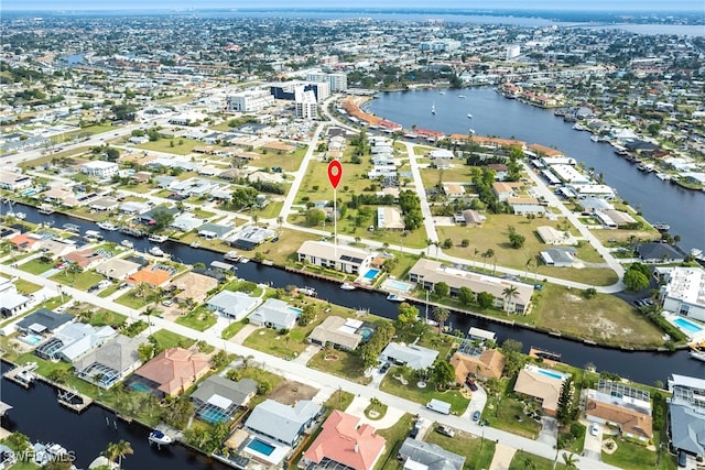 drone / aerial view featuring a water view