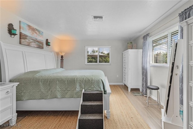 bedroom featuring light hardwood / wood-style flooring