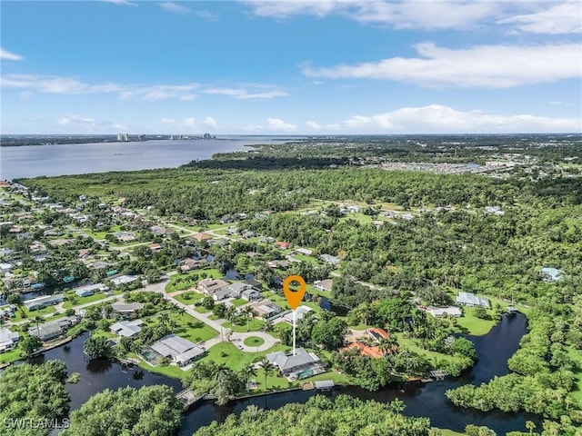 birds eye view of property featuring a water view