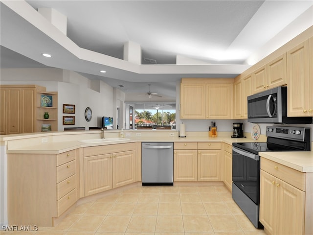 kitchen featuring sink, light tile patterned floors, light brown cabinets, ceiling fan, and stainless steel appliances