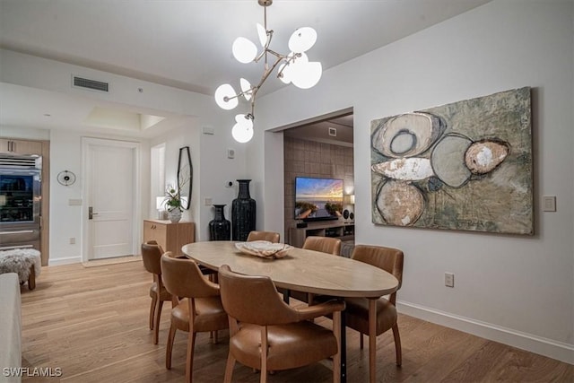 dining room with light wood-type flooring