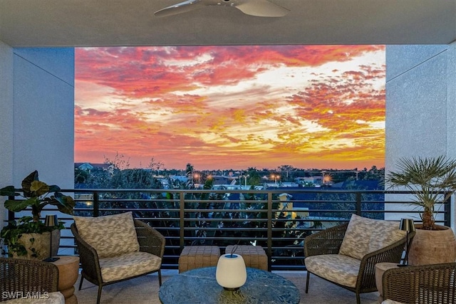 balcony at dusk with ceiling fan