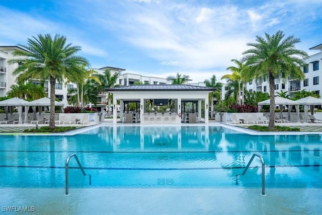 view of swimming pool with a gazebo and a patio