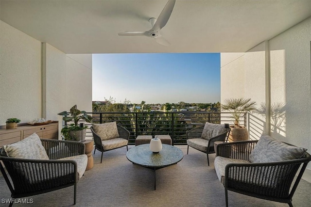 balcony with ceiling fan and an outdoor hangout area