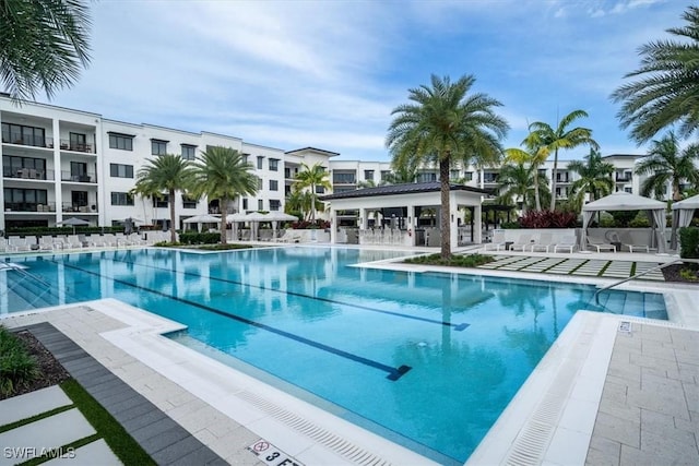 view of swimming pool featuring a patio area