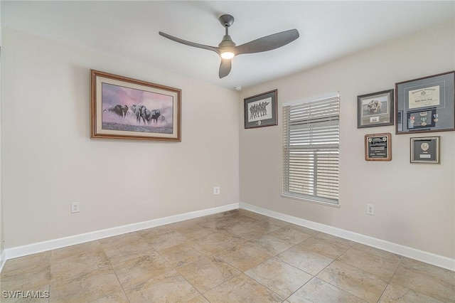 spare room featuring ceiling fan