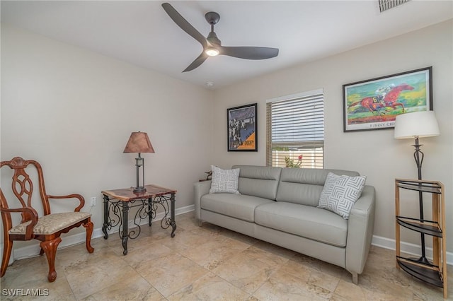 living room with ceiling fan