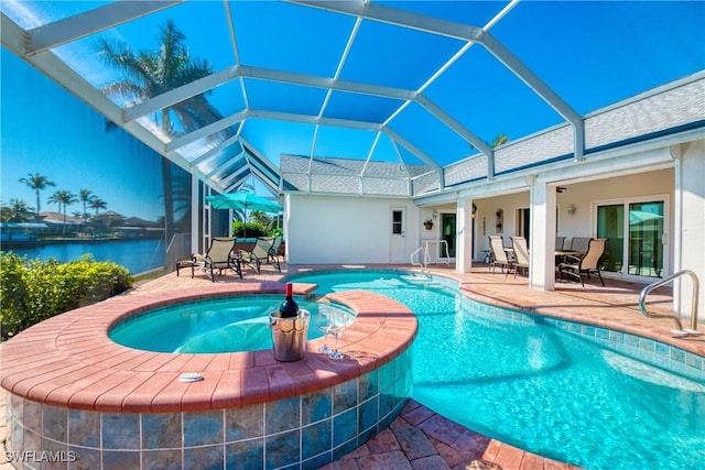 view of swimming pool with a water view, an in ground hot tub, a lanai, and a patio area