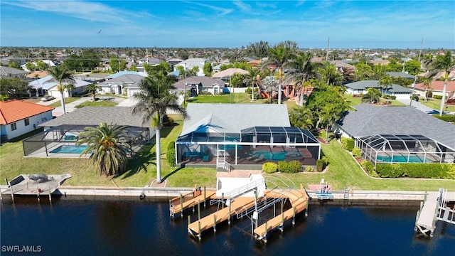 drone / aerial view with a water view