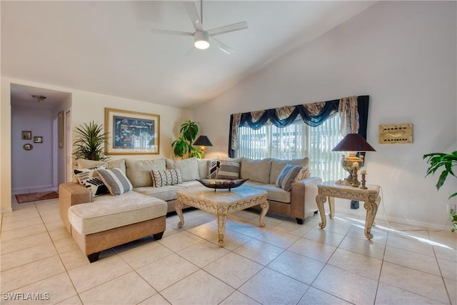 living room with ceiling fan, high vaulted ceiling, and light tile patterned floors