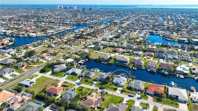 bird's eye view with a water view