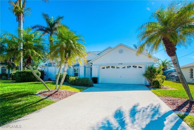 ranch-style house with a garage and a front yard