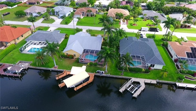 bird's eye view with a water view