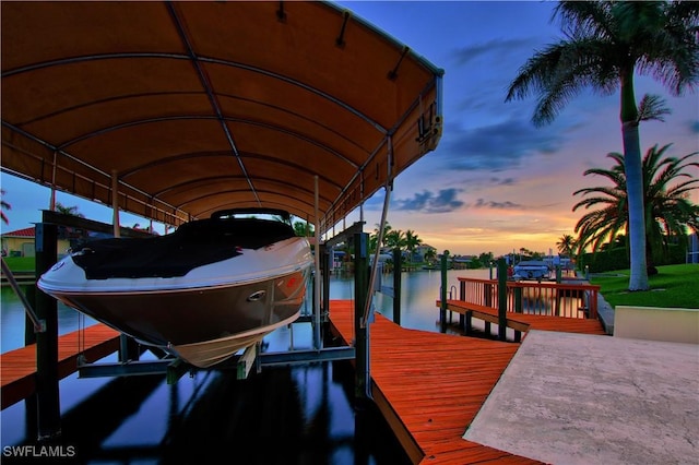 dock area with a water view