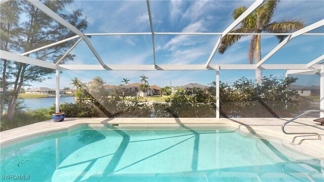 view of pool featuring a lanai and a water view