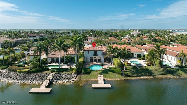 bird's eye view with a water view