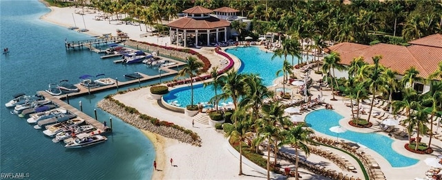 birds eye view of property with a water view