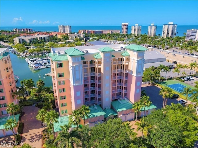 birds eye view of property featuring a water view