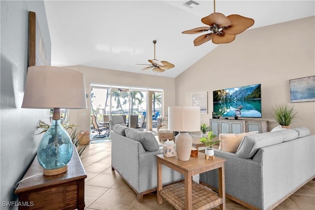 tiled living room featuring high vaulted ceiling and ceiling fan