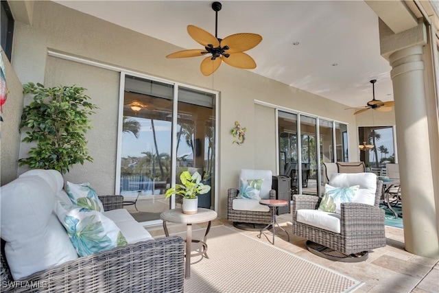 view of patio with ceiling fan and outdoor lounge area