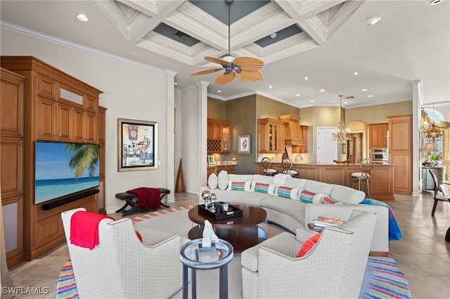 living room featuring light tile patterned flooring, coffered ceiling, ornamental molding, beamed ceiling, and ceiling fan with notable chandelier