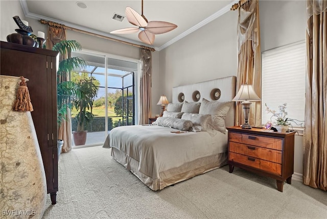 bedroom with crown molding, light colored carpet, access to exterior, and ceiling fan