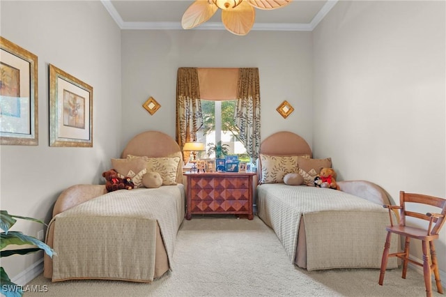 carpeted bedroom featuring crown molding