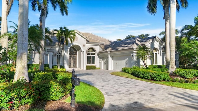 view of front of home with a garage